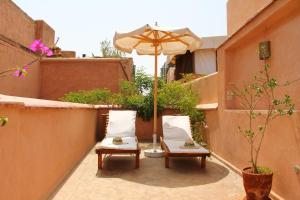 Patio nebo venkovní prostory v ubytování Riad El Morocco Hotel