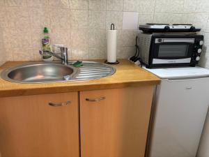 Η κουζίνα ή μικρή κουζίνα στο CityLoft Kassel 2 - Zentrale Unterkunft - Balkon - Netflix - Parkplatz