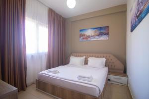 Postel nebo postele na pokoji v ubytování Hotel Princ