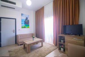 TV a/nebo společenská místnost v ubytování Hotel Princ