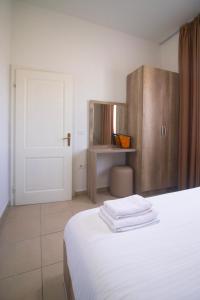 Postel nebo postele na pokoji v ubytování Hotel Princ