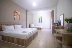 Postel nebo postele na pokoji v ubytování Hotel Princ