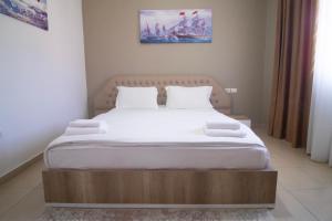 Postel nebo postele na pokoji v ubytování Hotel Princ