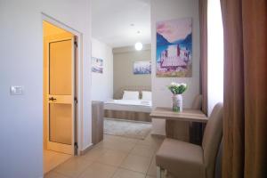 Postel nebo postele na pokoji v ubytování Hotel Princ