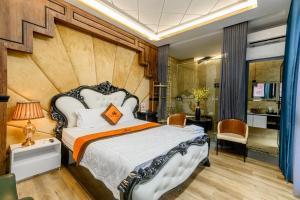 Postel nebo postele na pokoji v ubytování Goku Hotel