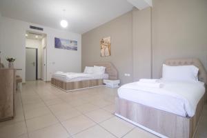 Postel nebo postele na pokoji v ubytování Hotel Princ