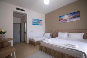 Postel nebo postele na pokoji v ubytování Hotel Princ