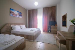 Postel nebo postele na pokoji v ubytování Hotel Princ