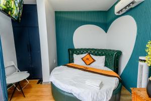 Postel nebo postele na pokoji v ubytování Goku Hotel