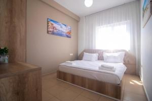 Postel nebo postele na pokoji v ubytování Hotel Princ