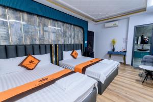 Postel nebo postele na pokoji v ubytování Goku Hotel