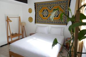 A bed or beds in a room at chez Aissam