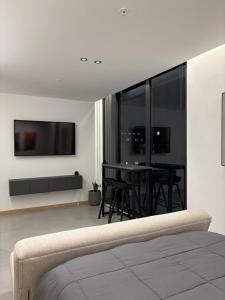 Postel nebo postele na pokoji v ubytování Suite in Iñaquito + 4 fotografie