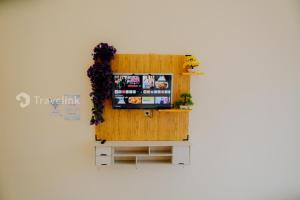 TV a/nebo společenská místnost v ubytování Dieng Luxury Camp By Travelink + 15 fotografií