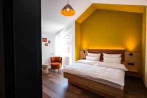 Voodi või voodid majutusasutuse Hotel Sandkorn toas