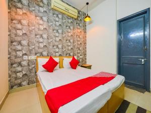 Postel nebo postele na pokoji v ubytování Hotel O Unique Delhi Home Stay