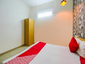 Postel nebo postele na pokoji v ubytování Hotel O Unique Delhi Home Stay