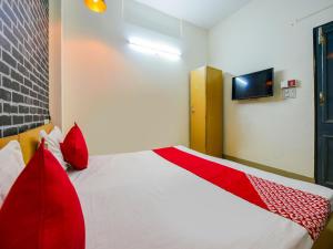 Postel nebo postele na pokoji v ubytování Hotel O Unique Delhi Home Stay