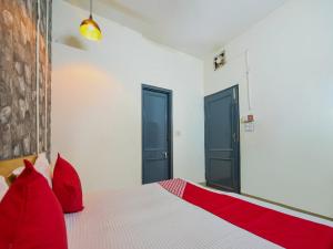 Postel nebo postele na pokoji v ubytování Hotel O Unique Delhi Home Stay