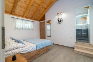 Postel nebo postele na pokoji v ubytování Villa Žuža + 37 fotografií