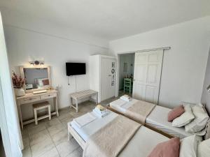 Postel nebo postele na pokoji v ubytování Sungate Villas