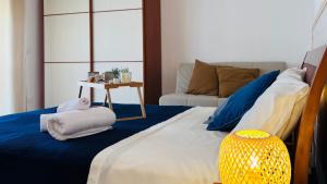 a bedroom with a bed with towels on it at Stella dei Venti B&B in San Salvo