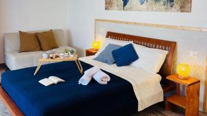 a bedroom with a bed with two towels on it at Stella dei Venti B&B in San Salvo