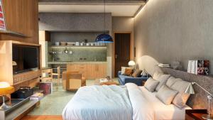 Ένα ή περισσότερα κρεβάτια σε δωμάτιο στο Gres apartamentos