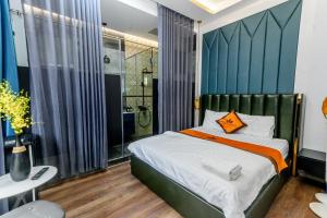 Postel nebo postele na pokoji v ubytování Goku Hotel