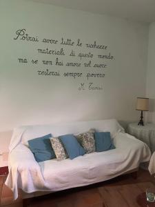 Postel nebo postele na pokoji v ubytování Agriturismo Podere Sant' Antonio