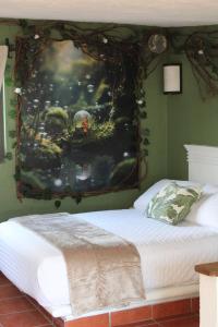 Postel nebo postele na pokoji v ubytování Hotel Mythos