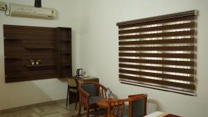 Fotografie z fotogalerie ubytování Hotel Vintage Palace v destinaci Tattamangalam