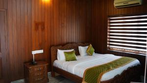 Postel nebo postele na pokoji v ubytování Hotel Vintage Palace