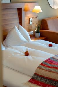 Postel nebo postele na pokoji v ubytování Hotel Alte Post