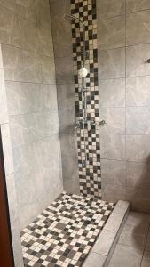 Ένα μπάνιο στο Gem Villa Inn