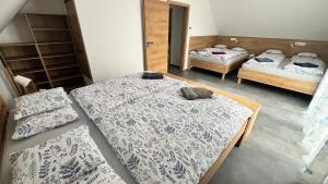 Postel nebo postele na pokoji v ubytování Apartmán U Karolíny