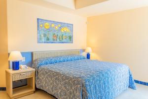 Postel nebo postele na pokoji v ubytování Zuana Beach Resort
