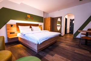 Voodi või voodid majutusasutuse Hotel Sandkorn toas