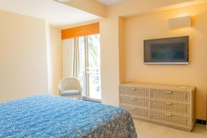 Postel nebo postele na pokoji v ubytování Zuana Beach Resort