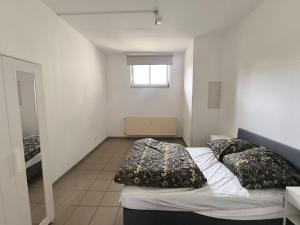 Ένα ή περισσότερα κρεβάτια σε δωμάτιο στο Helles 3 Zimmer Loft