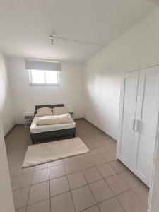 Ένα ή περισσότερα κρεβάτια σε δωμάτιο στο Helles 3 Zimmer Loft