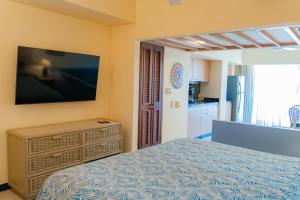 Postel nebo postele na pokoji v ubytování Zuana Beach Resort