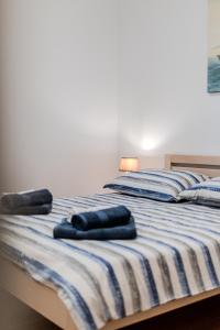 Posteľ alebo postele v izbe v ubytovaní Apartman Elephant