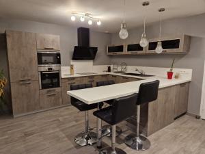 Kuchyň nebo kuchyňský kout v ubytování p'tite maison de PH
