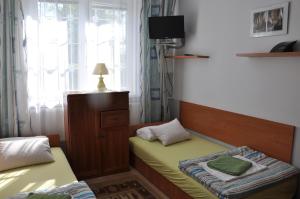 Posteľ alebo postele v izbe v ubytovaní Camping nr 61