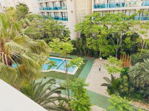 an overhead view of a courtyard with a pool in a building at Almar Albir in Albir