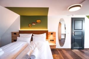 Voodi või voodid majutusasutuse Hotel Sandkorn toas
