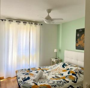 Ένα ή περισσότερα κρεβάτια σε δωμάτιο στο Appartement Résidence Quartier Vilette Paul Bert BOX GARAGE