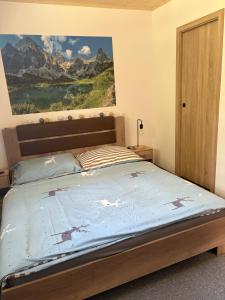 Ένα ή περισσότερα κρεβάτια σε δωμάτιο στο Chata na lúke