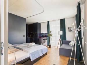 Voodi või voodid majutusasutuse modernes Studio an bester Lage toas